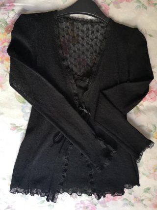 Conjunto chaqueta y top negro encaje
