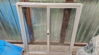 Ventana corredera aluminio gris