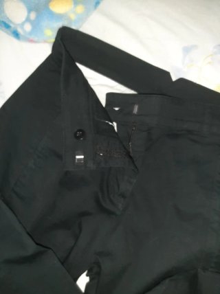 Pantalones de vestir negros y blancos