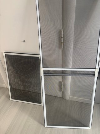 Mosquitera de ventana blanca