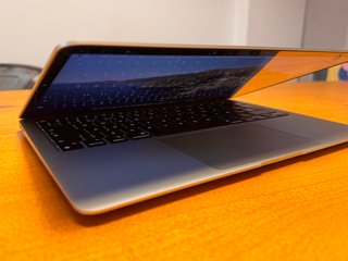 Macbook Air M1 8GB Plata + Caja + Funda protectora