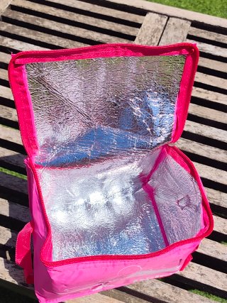 Bolsa térmica rosa con dibujo de pájaros