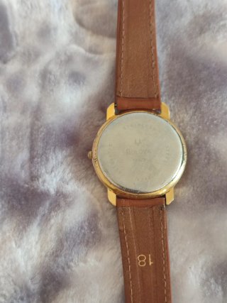 Reloj Bulova Automático Dorado y Marrón