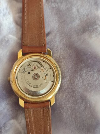 Reloj Bulova Automático Dorado y Marrón