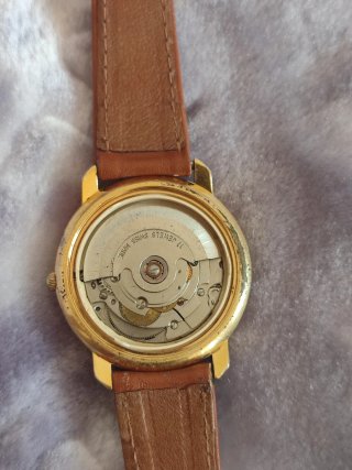 Reloj Bulova Automático Dorado y Marrón