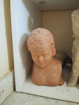 Busto de niño en terracota para pintar.