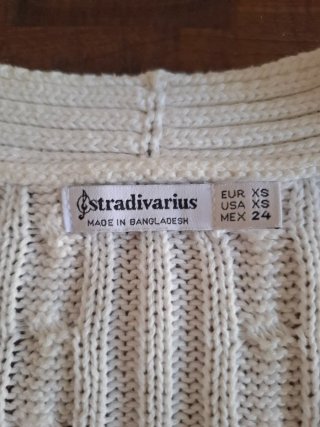 Rebeca Stradivarius blanca trenzada