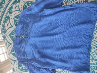 Blusa H&M azul con estampado cebra