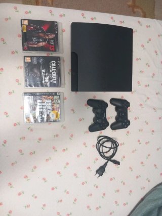 Consola PS3 Negra con 2 Mandos y Juegos