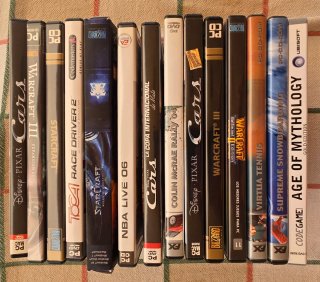 Lote 14 juegos PC: StarCraft, Warcraft, Cars, NBA