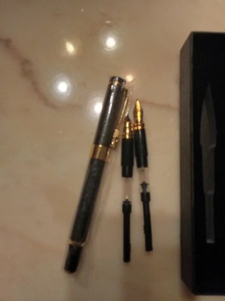 Set penne eleganti oro e nero