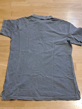 Polo Nike gris chico