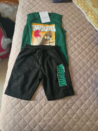 Completo bambino verde e nero