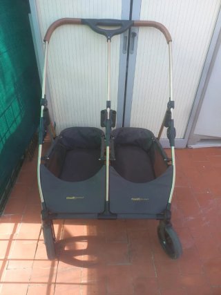 Carro gemelar negro y dorado
