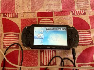 PSP 1004 Negra + 6 Juegos