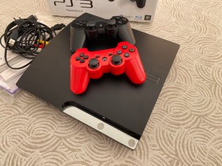 PlayStation 3 160GB con mando rojo