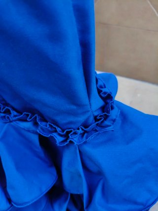 Traje de flamenca azul con volantes