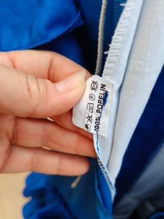 Traje de flamenca azul con volantes