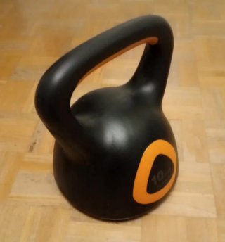 Pesa Rusa 10kg Negra y Naranja.