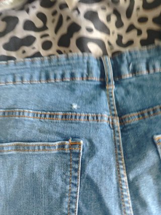 Gabardina azul y 3 vaqueros