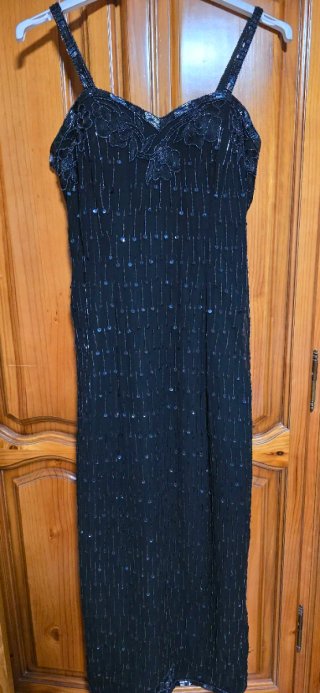 Vestido de fiesta negro con chaqueta