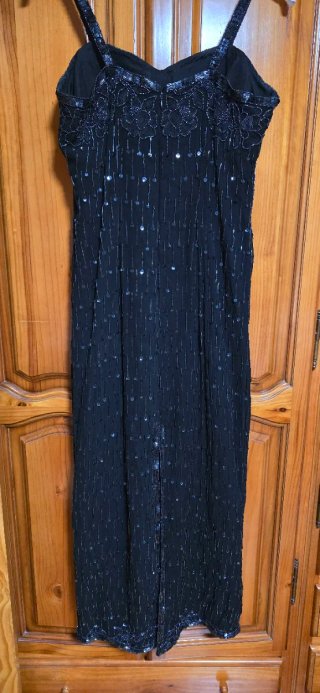 Vestido de fiesta negro con chaqueta