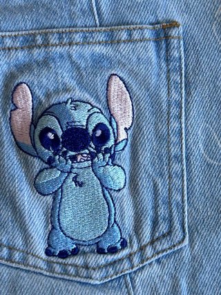 Jeans a zampa con stampa Stich Disney