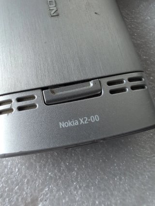 Nokia X2 argento e blu con caricabatterie