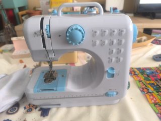 Mini Máquina de Coser Eléctrica