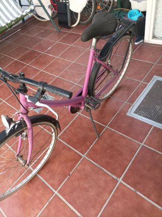 Bicicleta de señora morada
