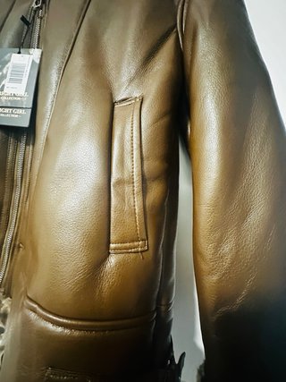 Parka de piel con capucha