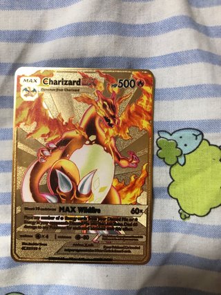 Cartas Pokémon Charizard DX y V Metálicas