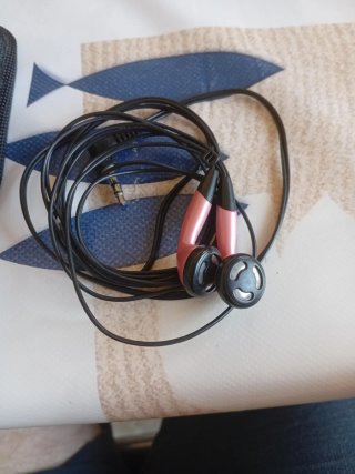 Funda GBA SP con auriculares aot más cargador