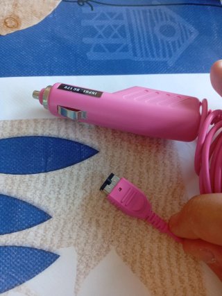 Funda GBA SP con auriculares aot más cargador