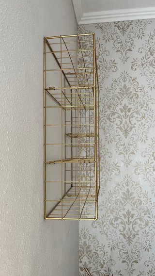 Estantería de pared dorada modular