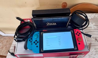 Nintendo Switch + Mario Kart 8 + 4 Joy-Con
