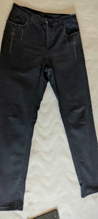 Vaqueros negros slim talle medio