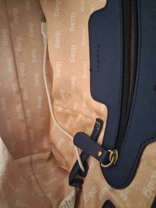Bolso de mano PIAGUI negro y dorado