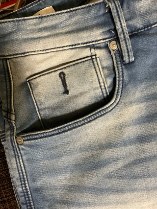 Pantalones cortos hombre beige y azul