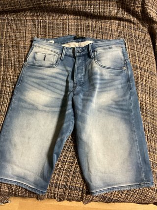 Pantalones cortos hombre beige y azul