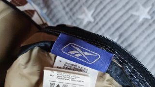 Mochila pequeña Reebok flores azul y rosa