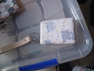 Llavero con espejo de gatos