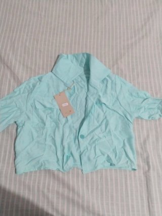 Blusa turquesa para chica