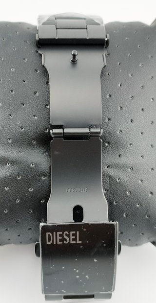 Reloj Diesel Spiked nuevo, negro y dorado