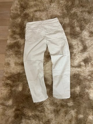 Jeans bianchi strappati da uomo
