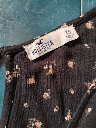 Tuta corta Hollister floreale nera XS / Jumpsuit