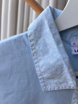 Polo Lacoste azul claro manga corta chica T.S