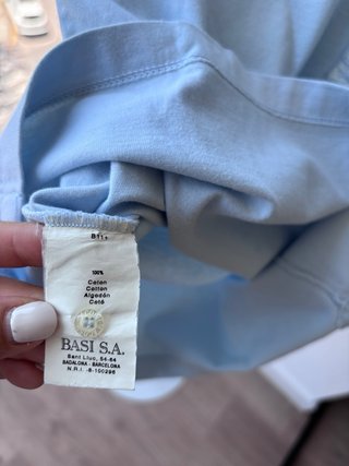 Polo Lacoste azul claro manga corta chica T.S
