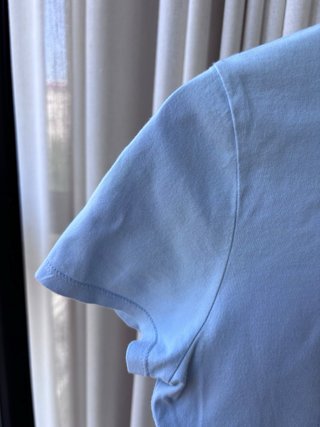 Polo Lacoste azul claro manga corta chica T.S