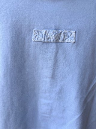 Polo Lacoste azul claro manga corta chica T.S